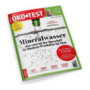 Titelblatt des Magazins „ÖKO-TEST“ mit grünem Rand und rotem Logo oben. Zentral steht der Schriftzug „Mineralwasser – Wie rein ist Ihr Sprudel? 56 Medium-Produkte im Test“. Im oberen Bereich ein aufgeschraubter grüner Flaschenhals mit aufsteigenden Sprudelblasen, rechts oben ein Porträt einer älteren, männlich gelesenen Person. Roter Kreis mit Text „Luxusgut Wasser – Warum auch Deutschland immer trockener wird“.