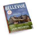 Titelbild des Immobilien-Magazins „BELLEVUE“ mit blauem Hintergrund; zentral ein Foto eines reetgedeckten Backsteinhauses mit Gartenmöbeln im Vordergrund. Aufschriften u. a.: „Großes Special Hamburg“, „Lieblingsinsel – Sylt zwischen Sehnsucht und Realität“, „Österreich – Theatralisch von Bregenz bis Wien“, „Spanien – 5 Trendregionen Ausblick für 2027“, „New York – Wohnen im Wolkenkratzer“ und „Weltweit Häuser unter 250.000 Euro“.