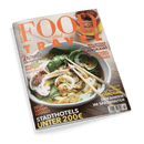 Cover des Magazins FOOD and TRAVEL mit einer Schale asiatischer Nudelsuppe und Schlagzeilen wie Rezepte FÜR DEN FRÜHLING und STADTHOTELS UNTER 200€.
