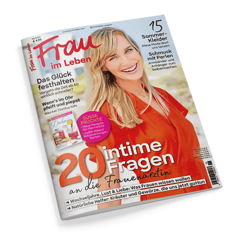 Titelseite des Magazins Frau im Leben mit einer lächelnden blonden Frau im orangefarbenen Oberteil und den Schlagzeilen Das Glück festhalten und 20 intime Fragen an die Frauenärztin.