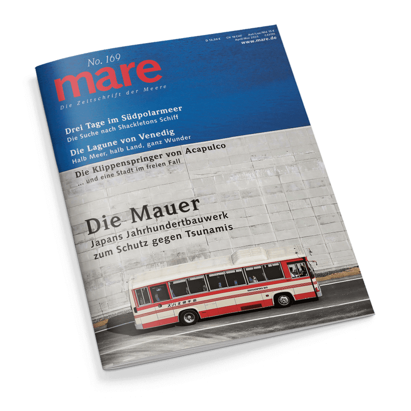 Magazincover mare No. 169: Japanischer Bus vor grauer Betonmauer, mit Schlagzeile Die Mauer.