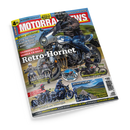 Schräg dargestelltes Cover der Motorradzeitschrift „MOTORRAD NEWS“ auf schwarzem Hintergrund, mit einer helmtragenden Person auf einem silber-blauen Honda-Motorrad. Sichtbare Texte: „SERVICE: MOTORRAD UND HITZE“, „Schon gefahren!“, „Retro-Hornet“, „FAHRERBERICHT: HONDA CB1000 F“, „Kawasaki W800“, „YAMAHA XT 500“, „REISEFIEBER“ und „Schottland & Türkei“; mehrere kleinere Motorradfotos ergänzen das Cover.